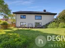 Rückansicht mit Garten und Terrasse