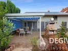 Überdachte Terrasse mit Markise