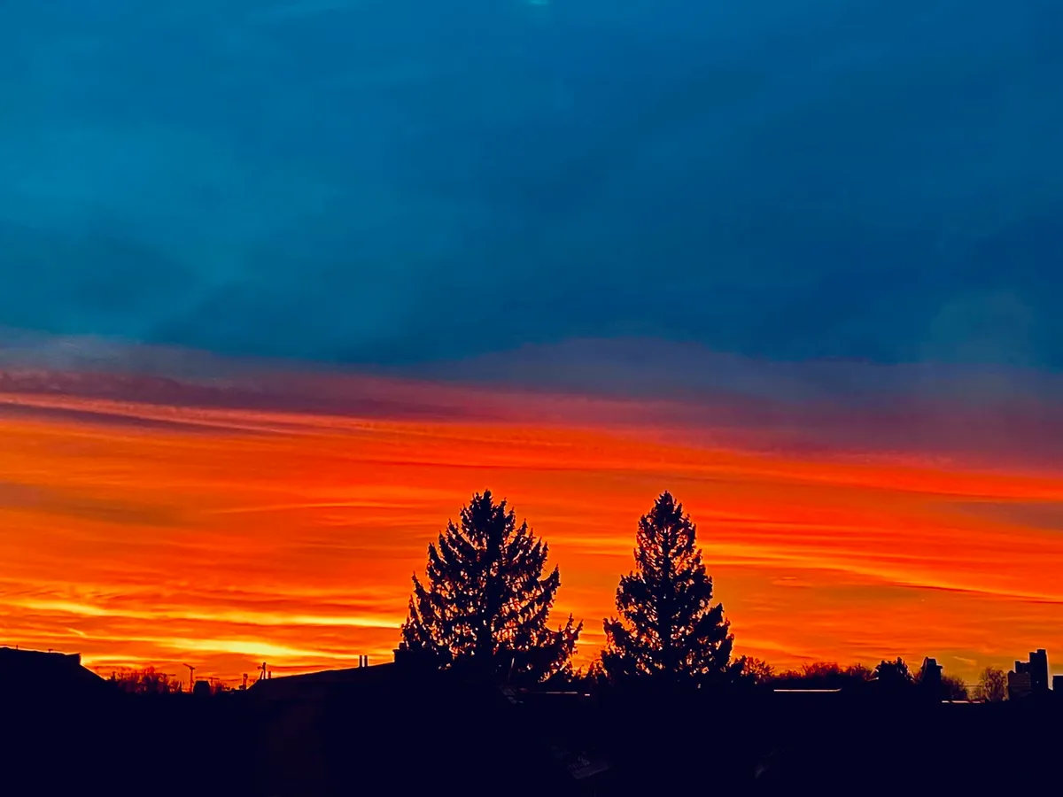 Blick vom Balkon in den Sonnenuntergang